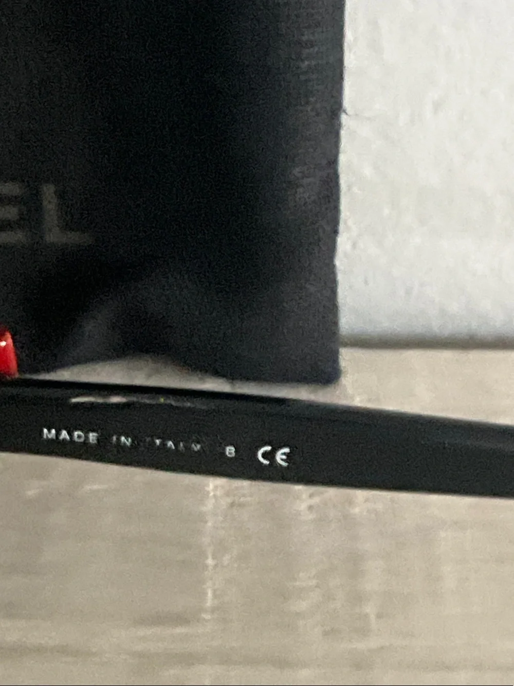 CHANEL Black Sunglasses with Red Accents and Gradient Lenses